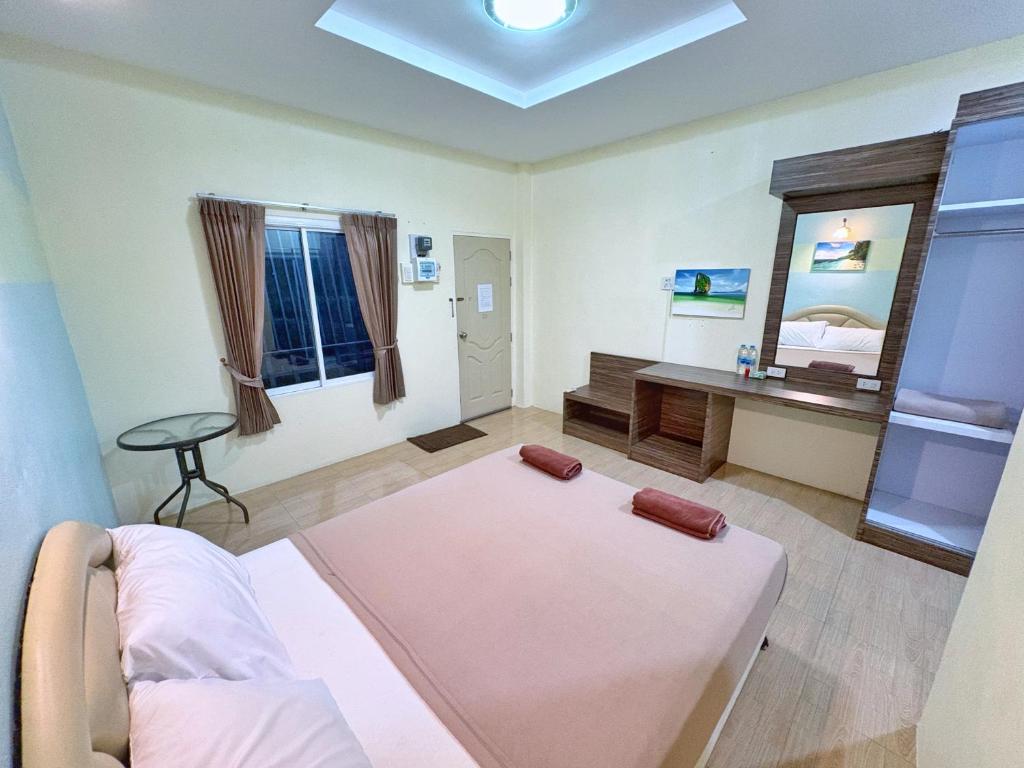 Postel nebo postele na pokoji v ubytování Krabi Ava Hill