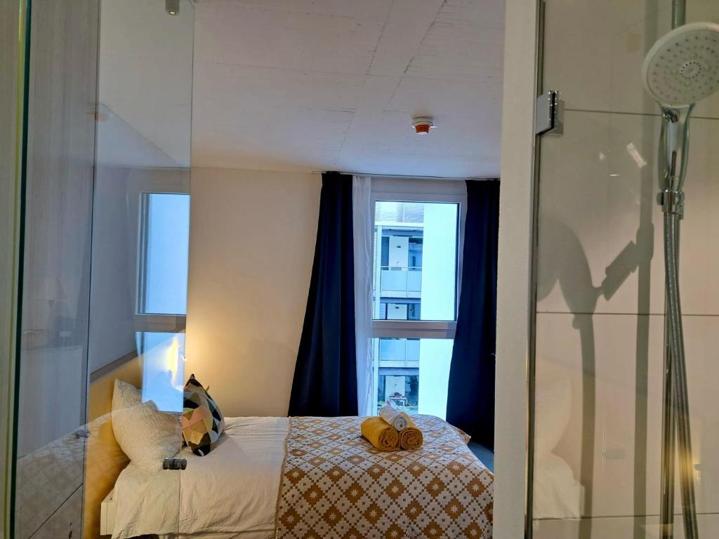Postel nebo postele na pokoji v ubytování N's Hotel - Self-Check-in Hotel