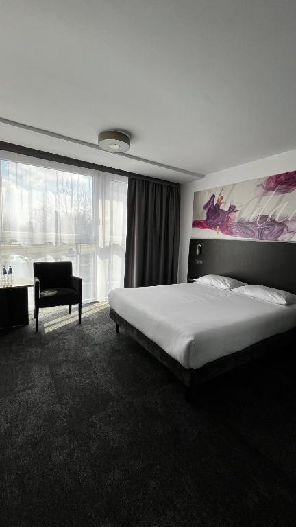 Postel nebo postele na pokoji v ubytování B&B HOTEL Bytom