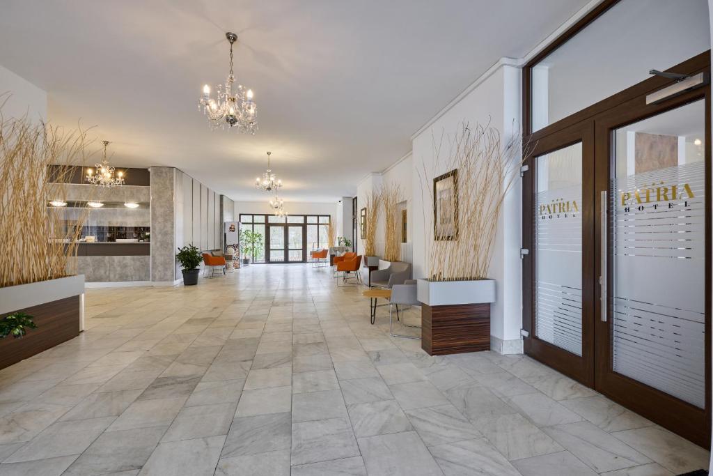 Kuchyň nebo kuchyňský kout v ubytování PATRIA HOTEL