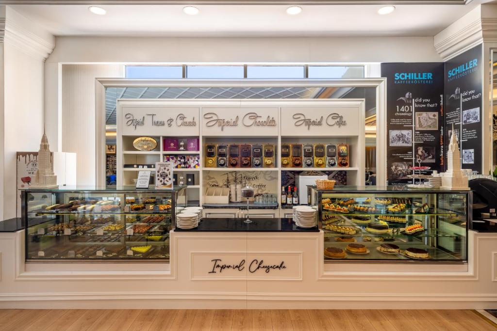 a store front of a food court in a mall at Delphin Imperial Lara in Lara