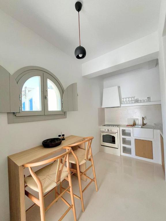 Kuchyň nebo kuchyňský kout v ubytování Ios Alcyon Blue Suites