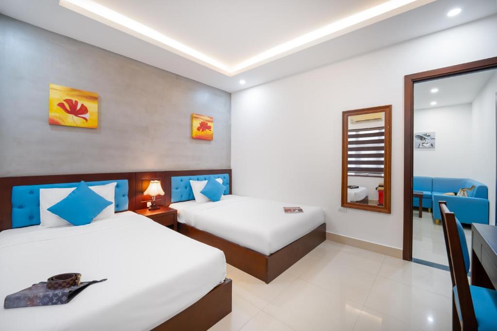 Postel nebo postele na pokoji v ubytování Platinum Beach Hotel & Apartment