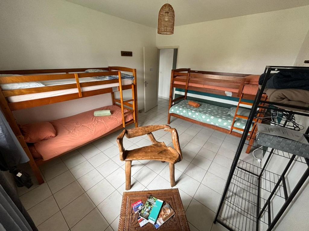 Postel nebo postele na pokoji v ubytování Ti'Kratèr Chambres d'hôtes
