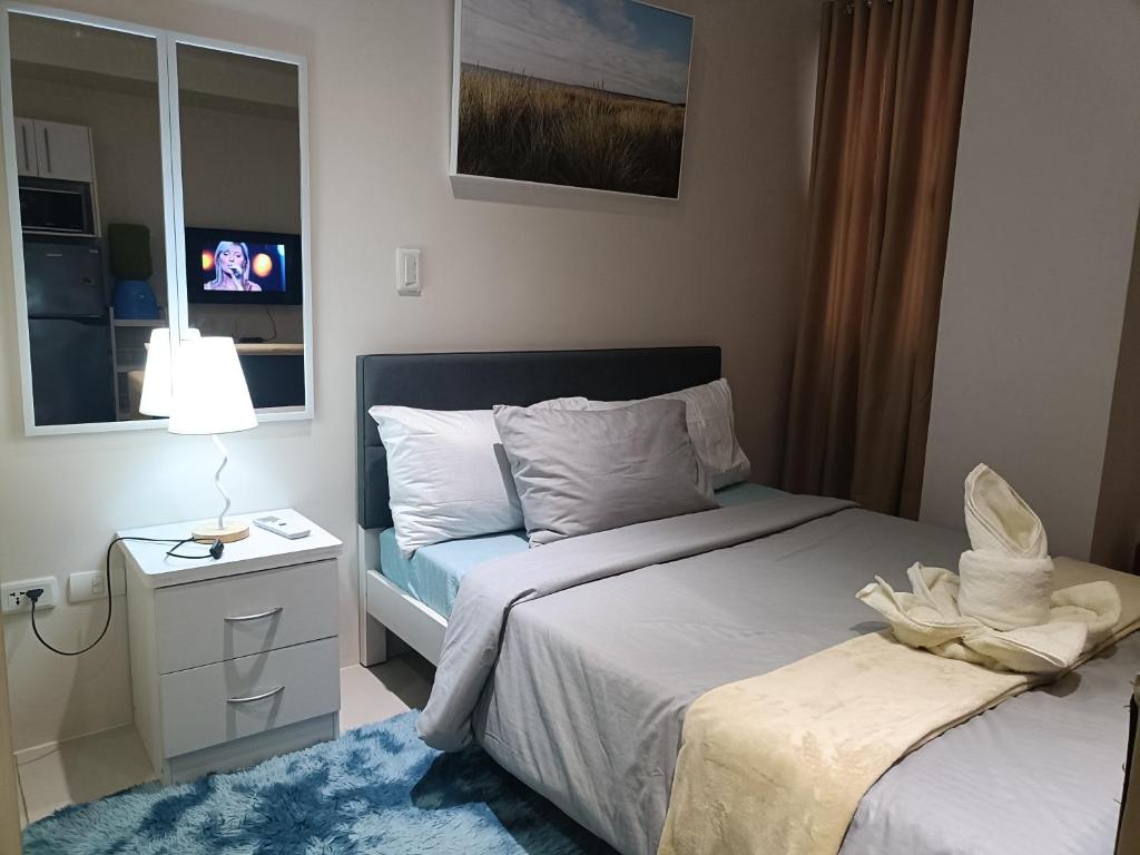 Postel nebo postele na pokoji v ubytování Studio type staycation Matina Enclaves condo fully furnished