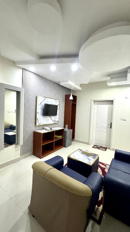 TV a/nebo společenská místnost v ubytování Collection O Muscat Airport Hotel Apartments