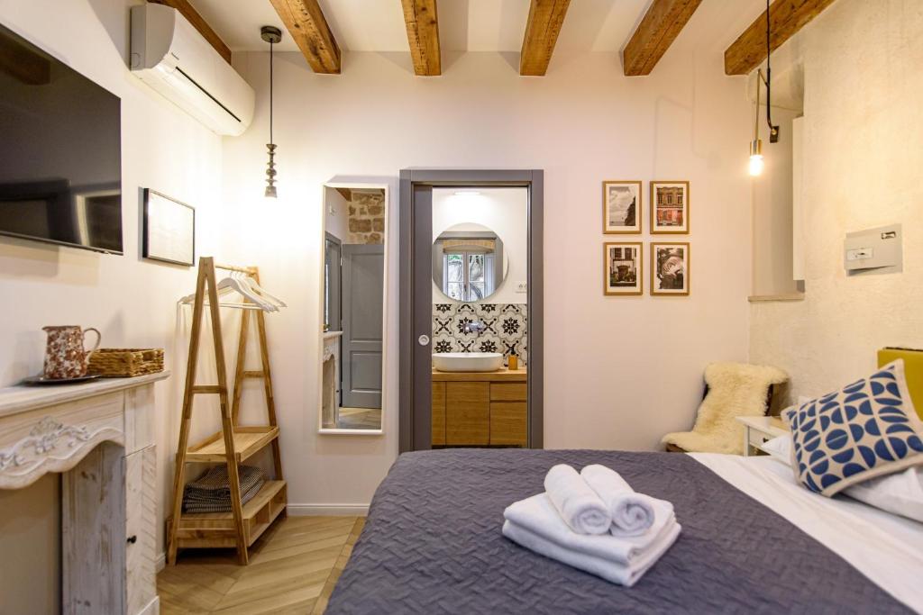 Posteľ alebo postele v izbe v ubytovaní VILLA MONTE SANTO by DuHomes