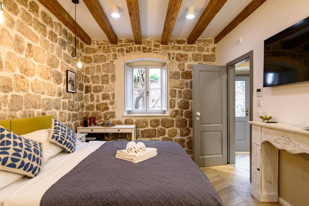 Posteľ alebo postele v izbe v ubytovaní VILLA MONTE SANTO by DuHomes