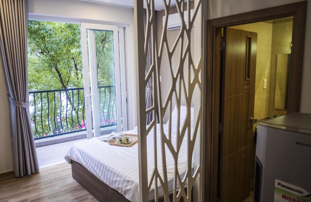 Ένα ή περισσότερα κρεβάτια σε δωμάτιο στο Spring Light Home