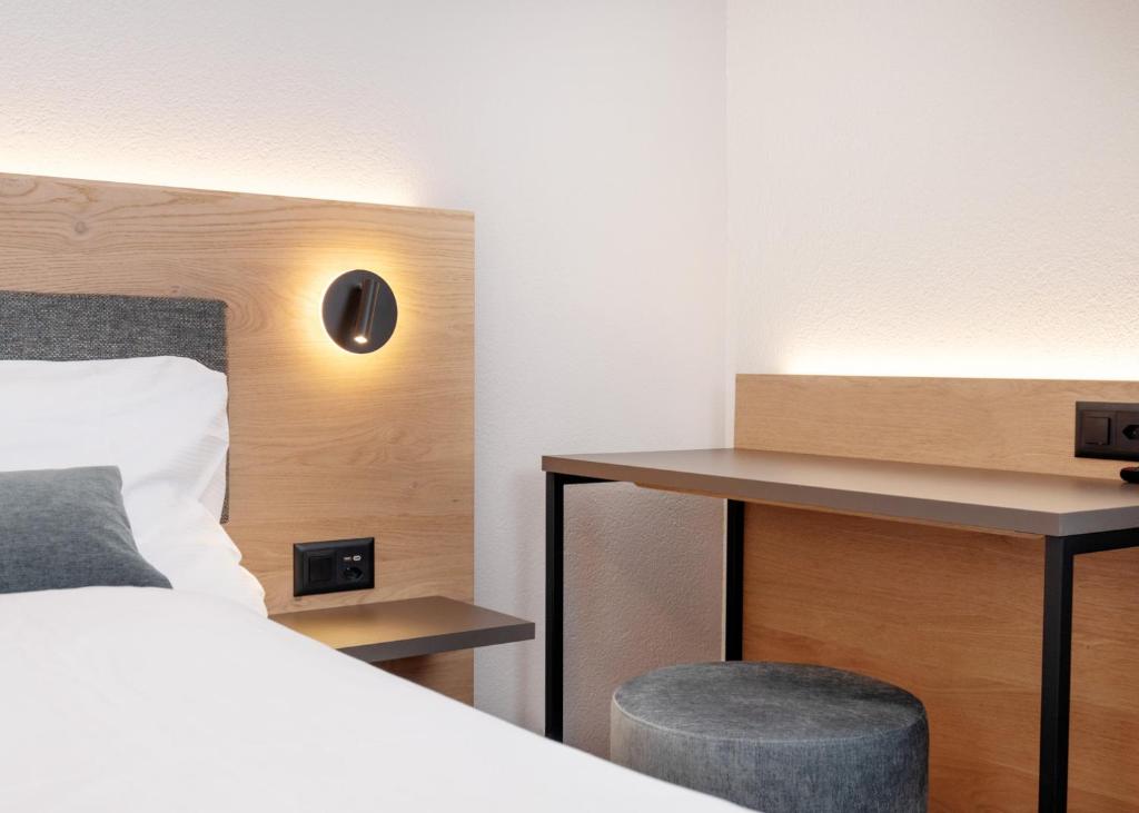 Postel nebo postele na pokoji v ubytování Hotel Restaurant Kreuz
