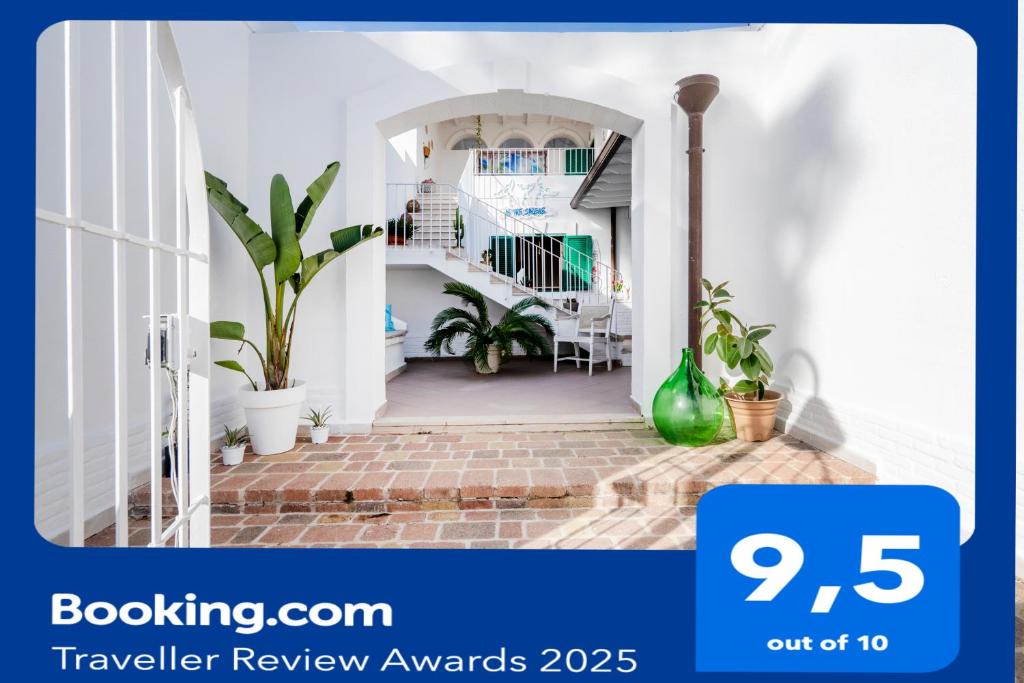 a hallway with a staircase in a house at Le tre sirene in Porto Cesareo