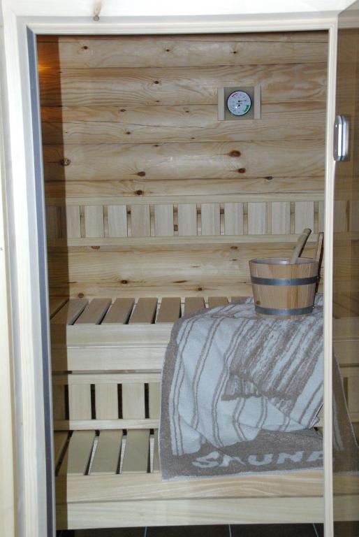 Postel nebo postele na pokoji v ubytování Alpenglück Blockhaus in der Ziegelwies Füssen