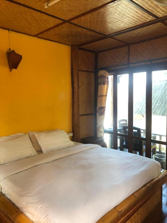 Postel nebo postele na pokoji v ubytování Pai resort pageryaw