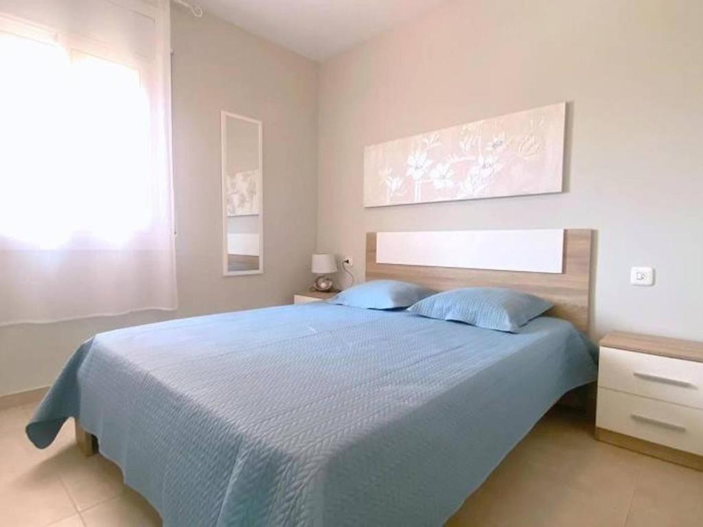 A bed or beds in a room at OLIMPE 2 8