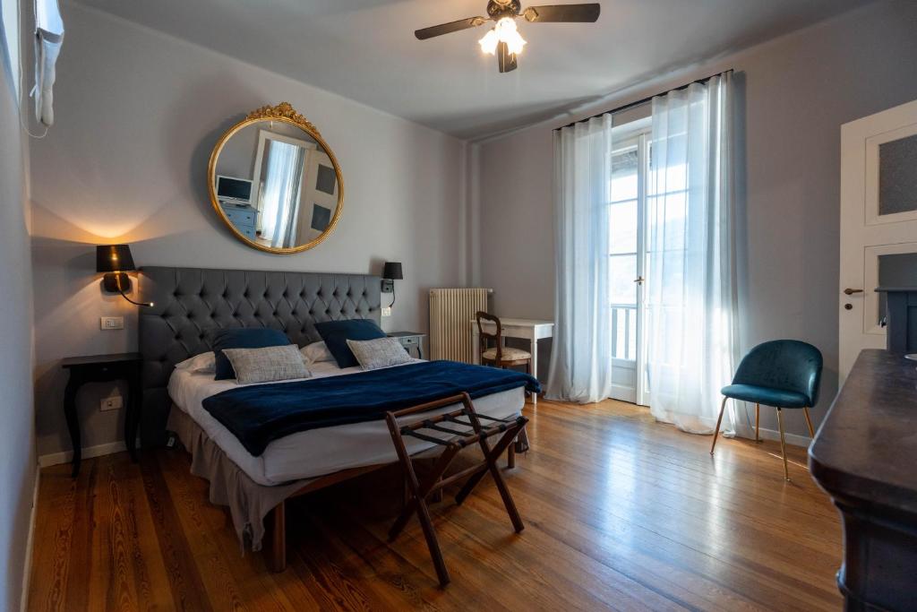 Postel nebo postele na pokoji v ubytování Villa Toscanini