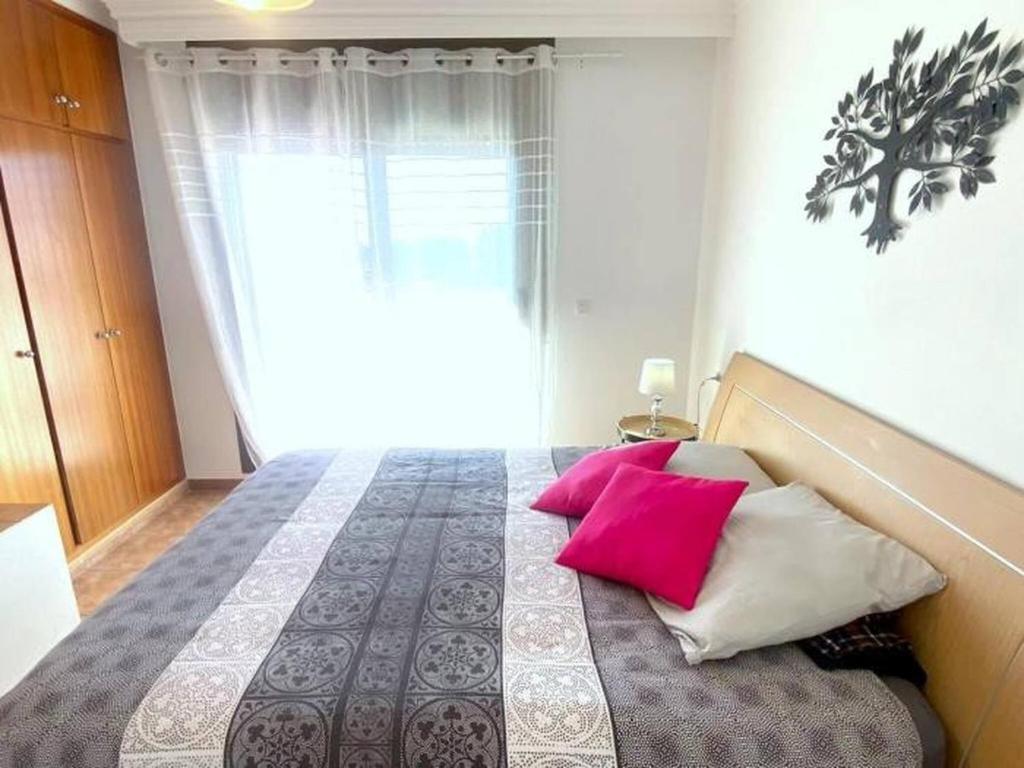A bed or beds in a room at Bages