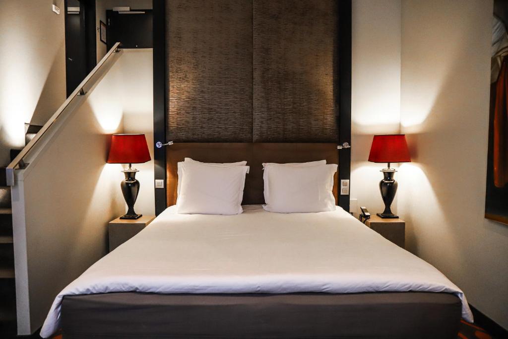 Postel nebo postele na pokoji v ubytování The Dominican, Brussels, a Member of Design Hotels