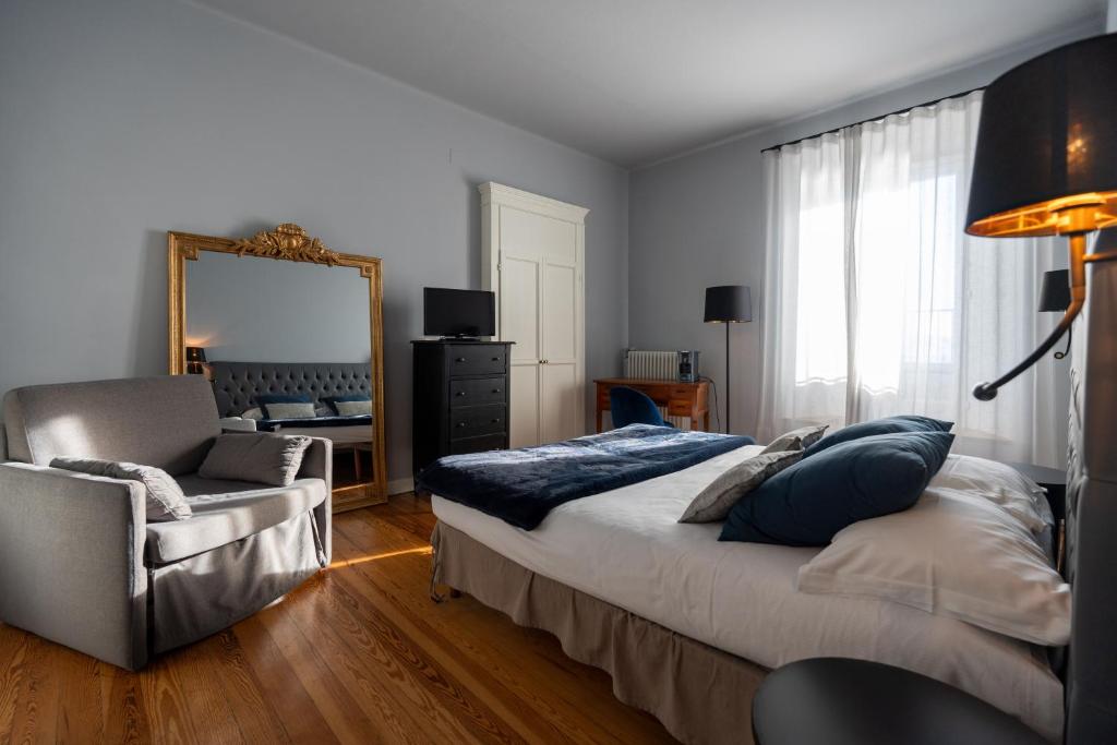 Postel nebo postele na pokoji v ubytování Villa Toscanini