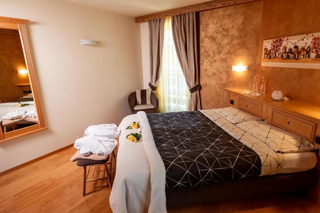 Postel nebo postele na pokoji v ubytování Romantic Charming Hotel Rancolin