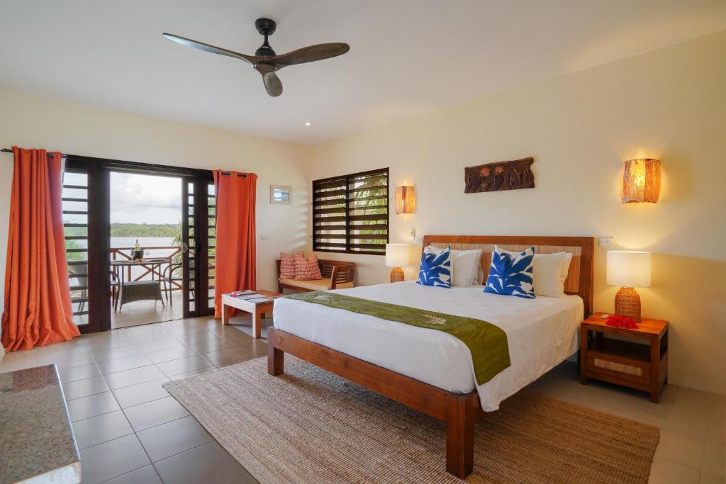Postel nebo postele na pokoji v ubytování Nasama Resort