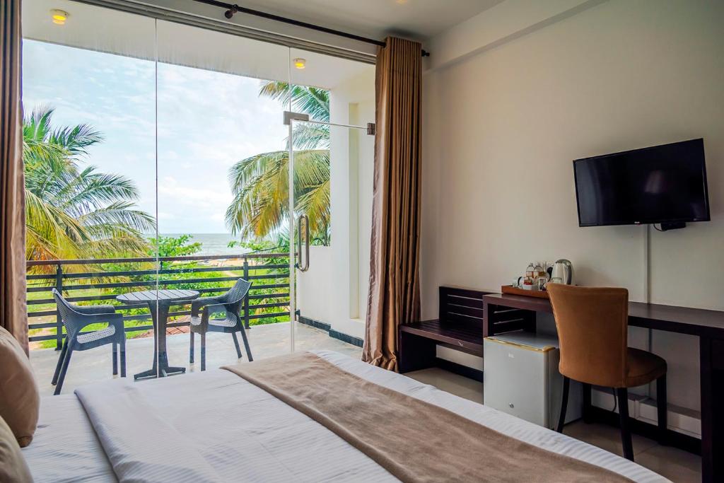 TV a/nebo společenská místnost v ubytování Beverly Beach Negombo