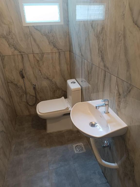 Koupelna v ubytování Royal Residency