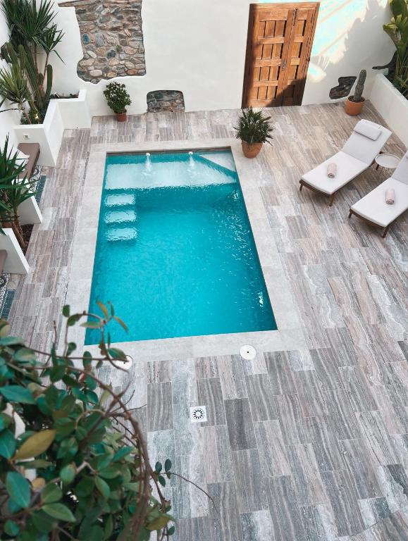 Bazén v ubytování Elysium Luxury Stays nebo v jeho okolí