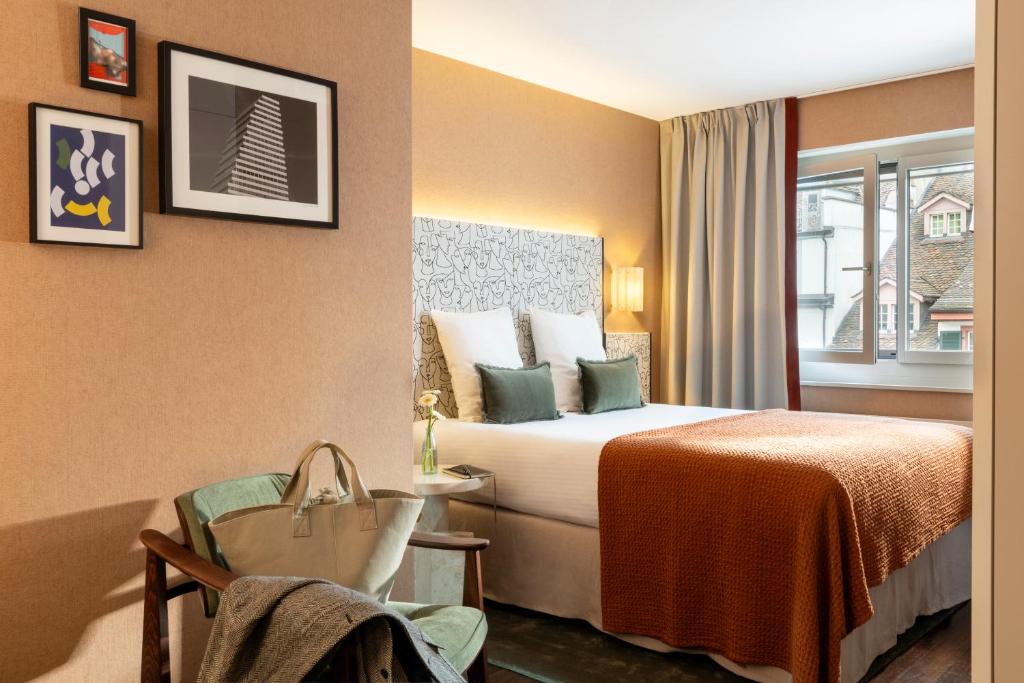 Postel nebo postele na pokoji v ubytování Hotel D - Basel - Fully Renovated 2025