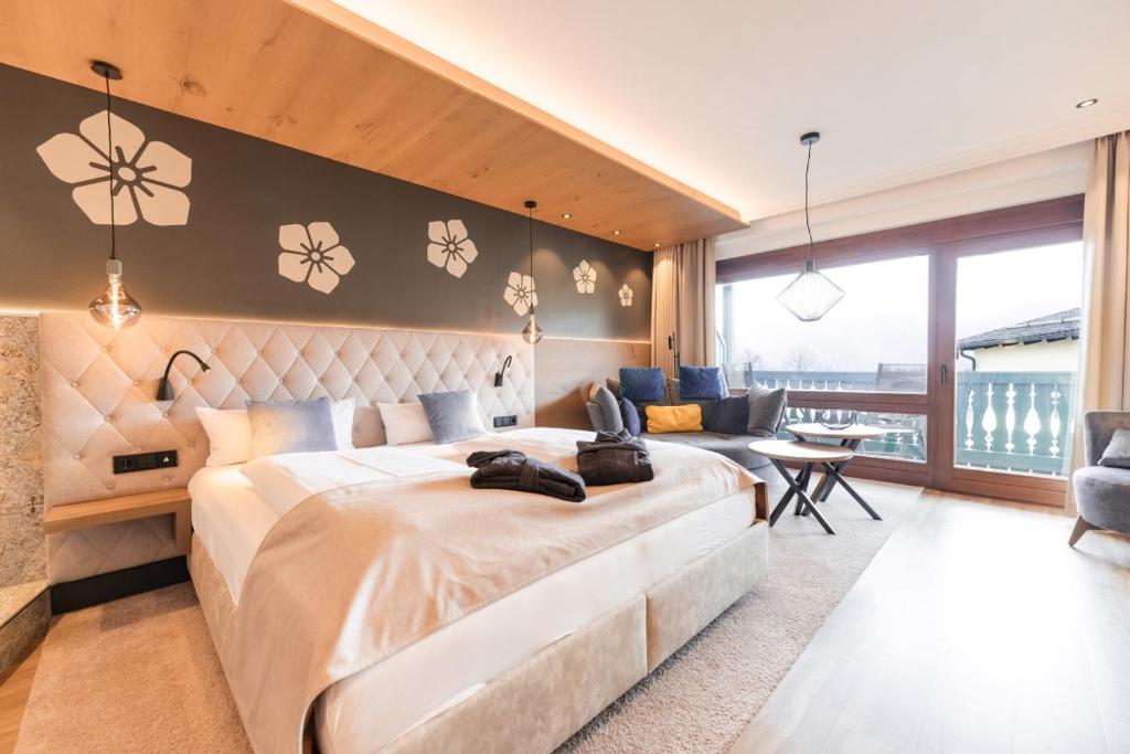 Postel nebo postele na pokoji v ubytování Posthotel Rattenberg