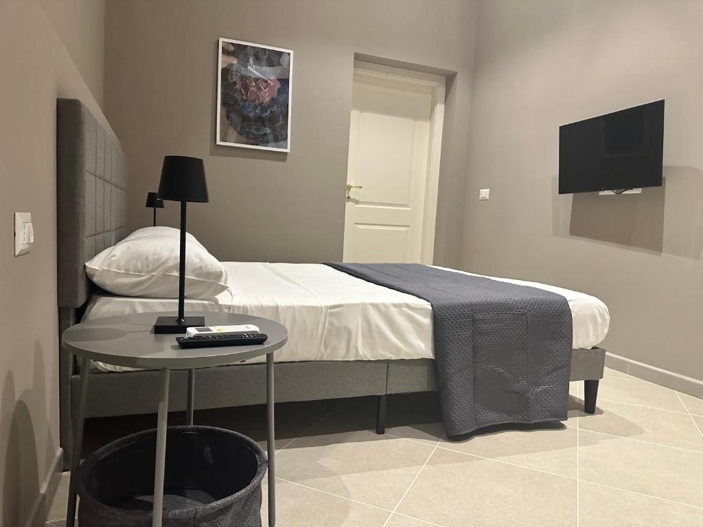Postel nebo postele na pokoji v ubytování Sunset Palace Guesthouse