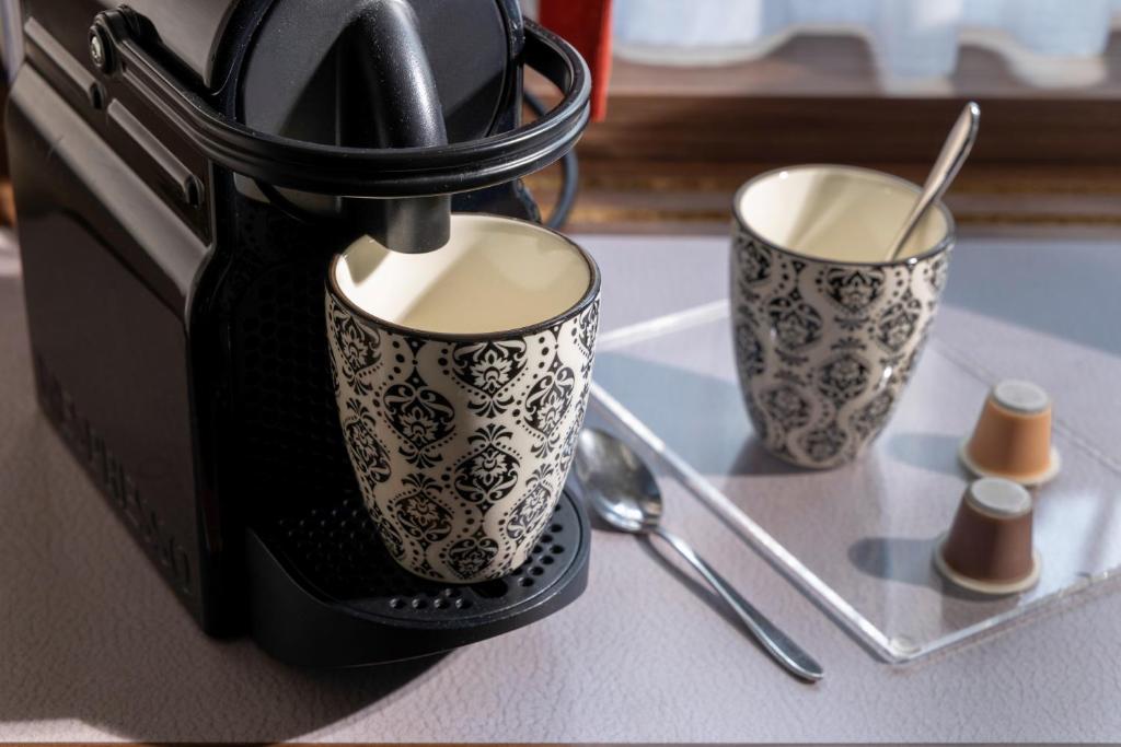 Kemudahan buat kopi dan teh di Hotel D - Basel - Fully Renovated 2025
