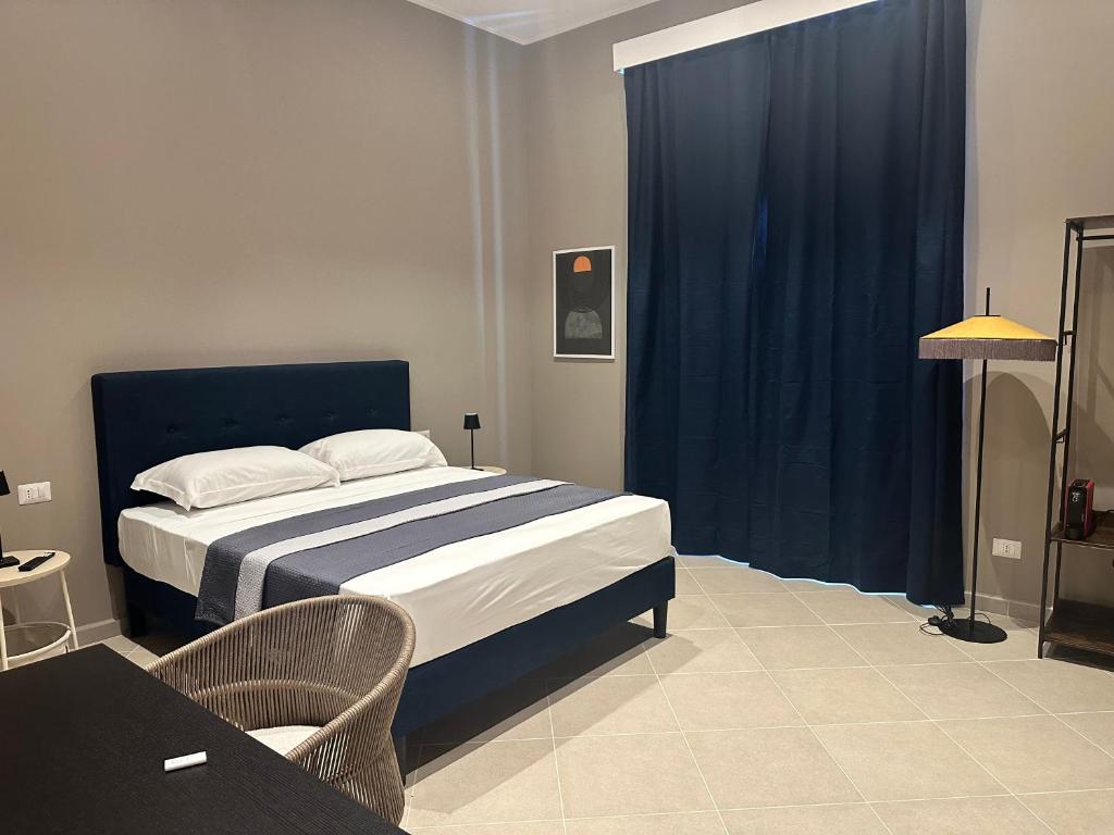 Postel nebo postele na pokoji v ubytování Sunset Palace Guesthouse