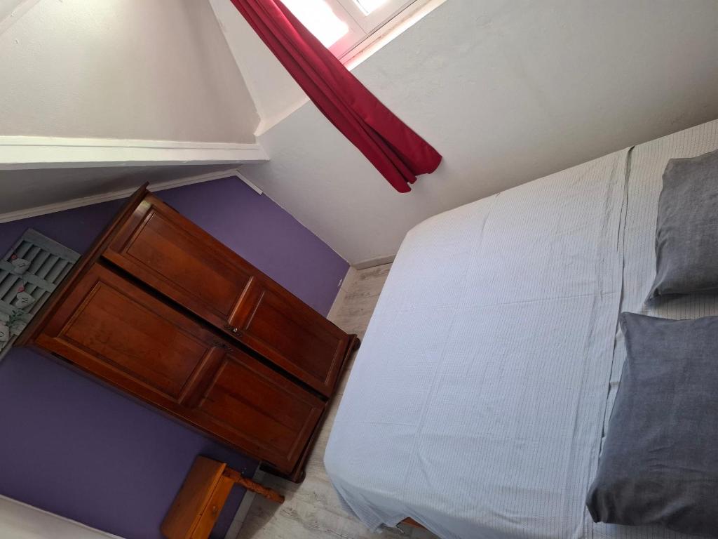 Postel nebo postele na pokoji v ubytování Chambre double