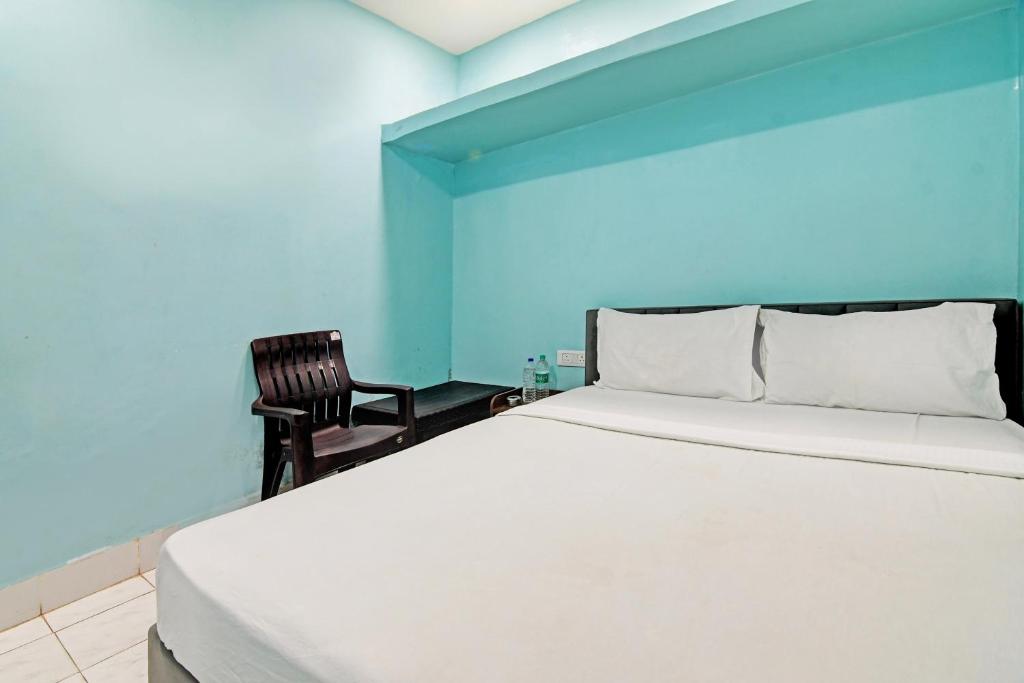 Postel nebo postele na pokoji v ubytování Hotel O NANDAN