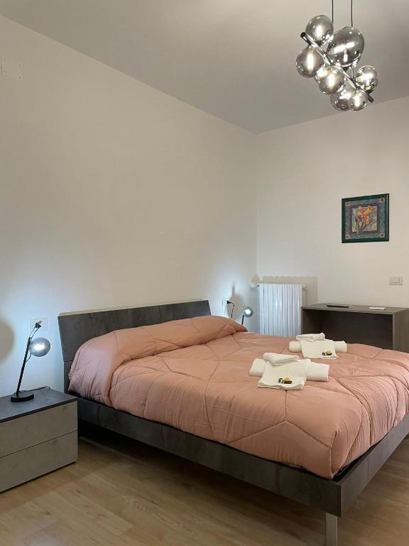 Postel nebo postele na pokoji v ubytování Le Ninfe Guest House