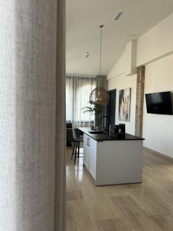TV a/nebo společenská místnost v ubytování Elysium Luxury Stays