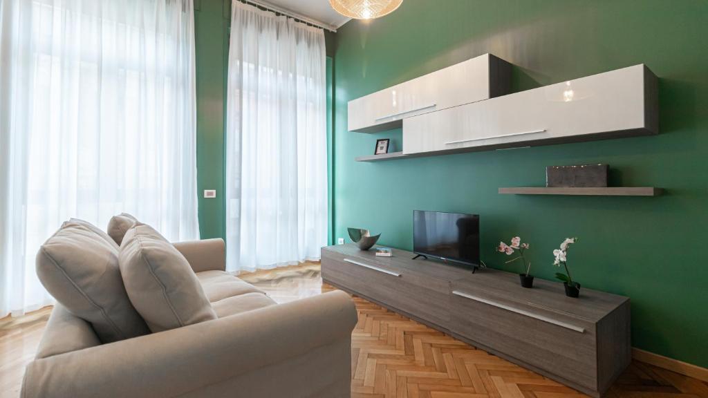 Televízia a/alebo spoločenská miestnosť v ubytovaní Italianway - Cannobio 8