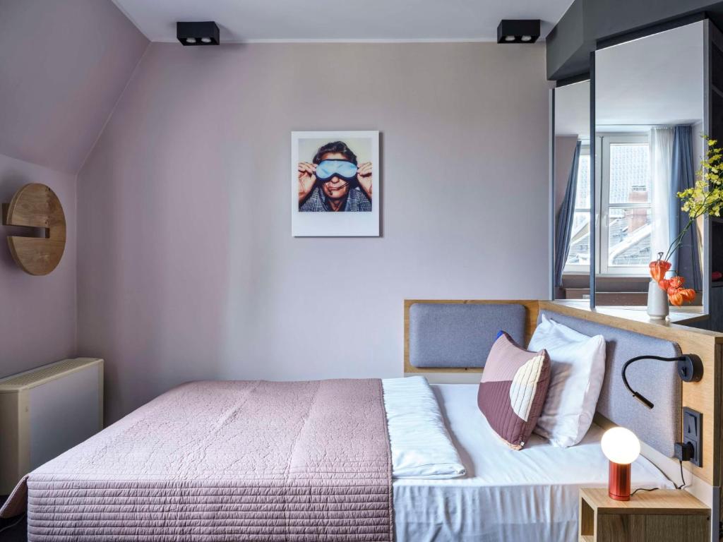 Postel nebo postele na pokoji v ubytování Flemings Hotel Frankfurt-Central