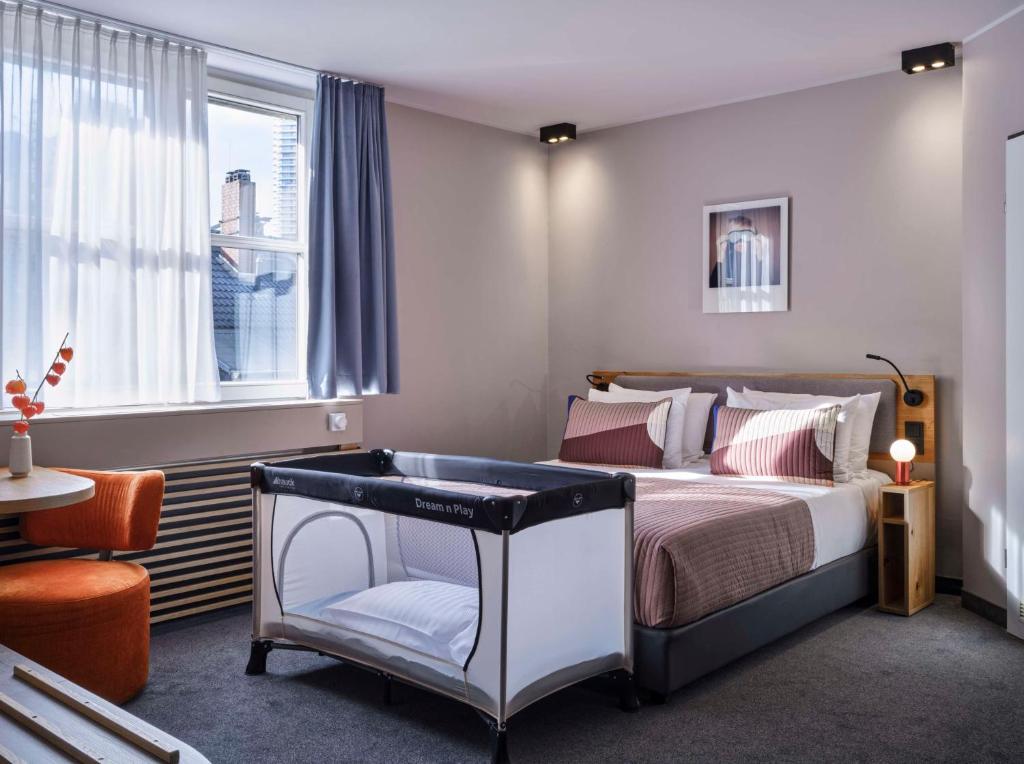 Postel nebo postele na pokoji v ubytování Flemings Hotel Frankfurt-Central