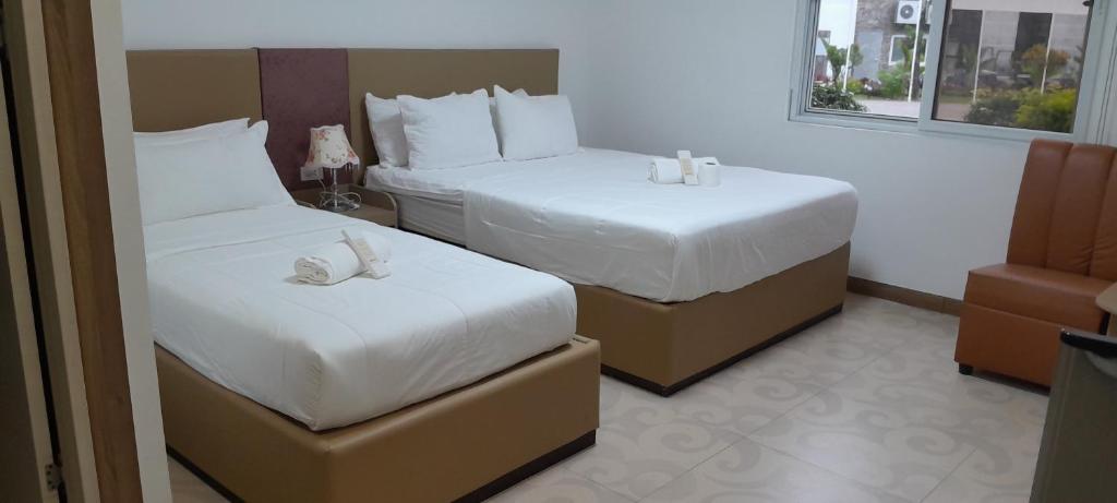 Postel nebo postele na pokoji v ubytování Airport Hotel Clark