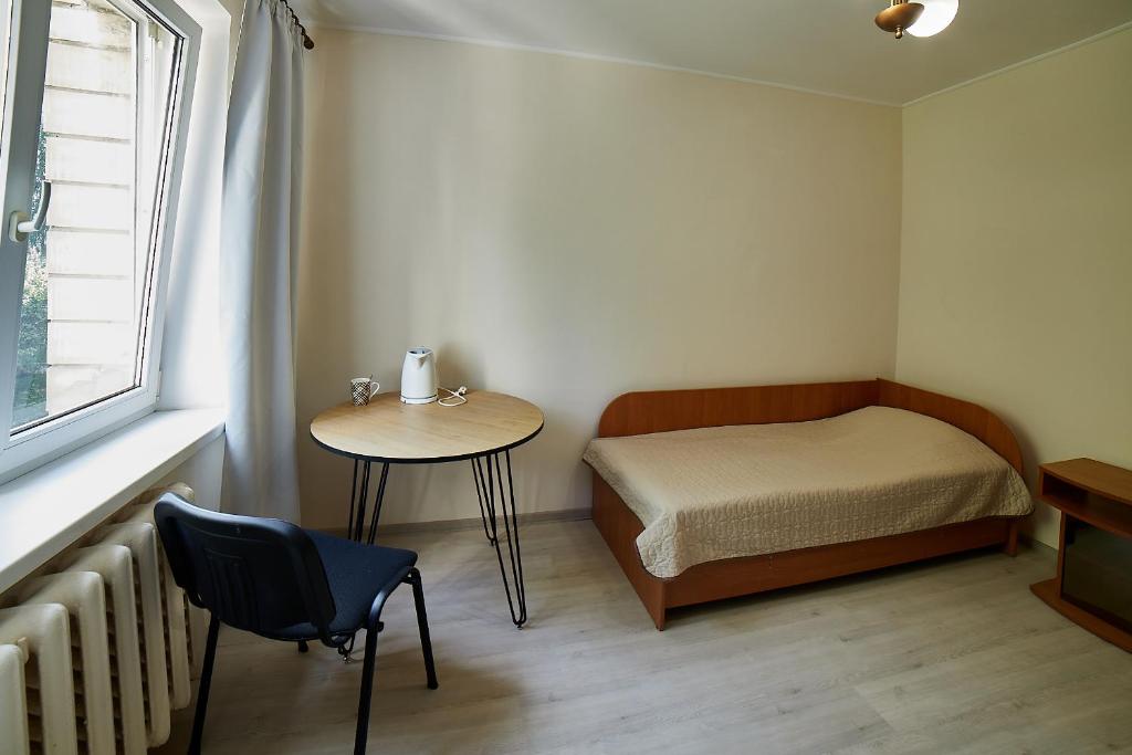 Postel nebo postele na pokoji v ubytování Sacvoyage