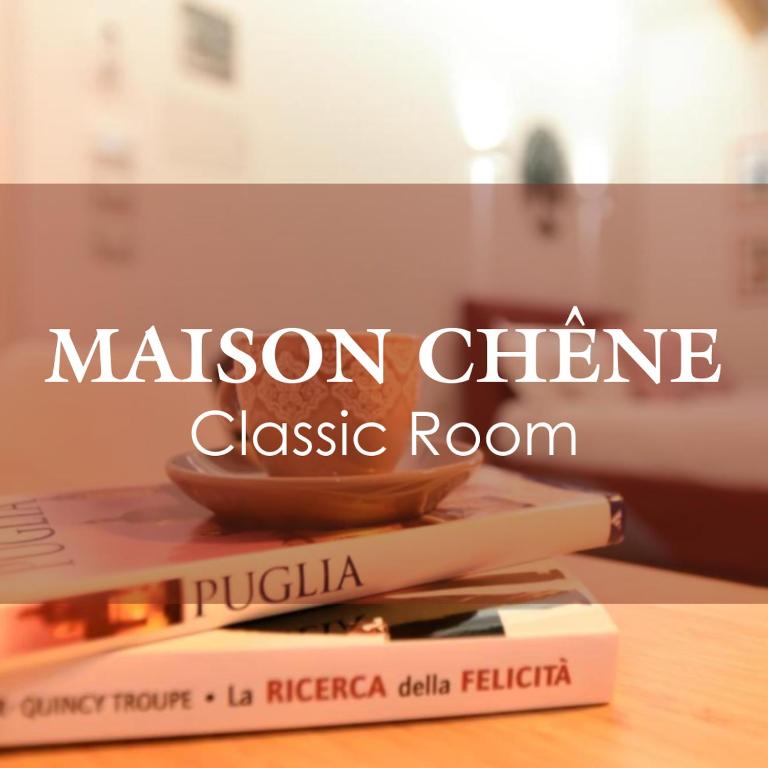 a book on a table with the words mission office classic room at Maison Chene petit appartement in Bisceglie
