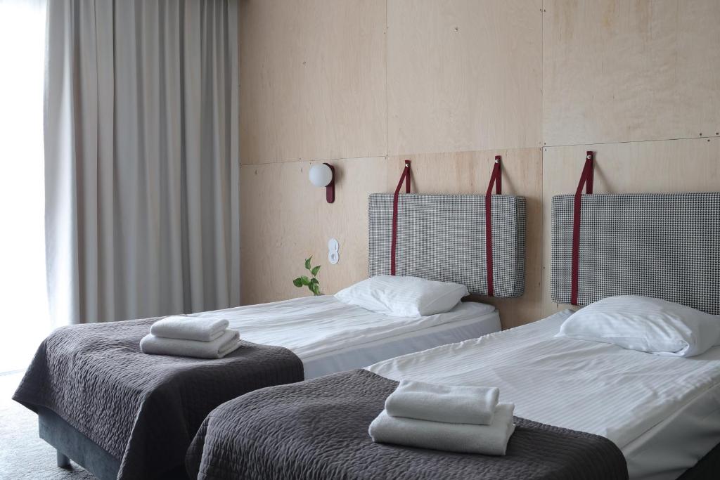 Postel nebo postele na pokoji v ubytování Baltic Hotel