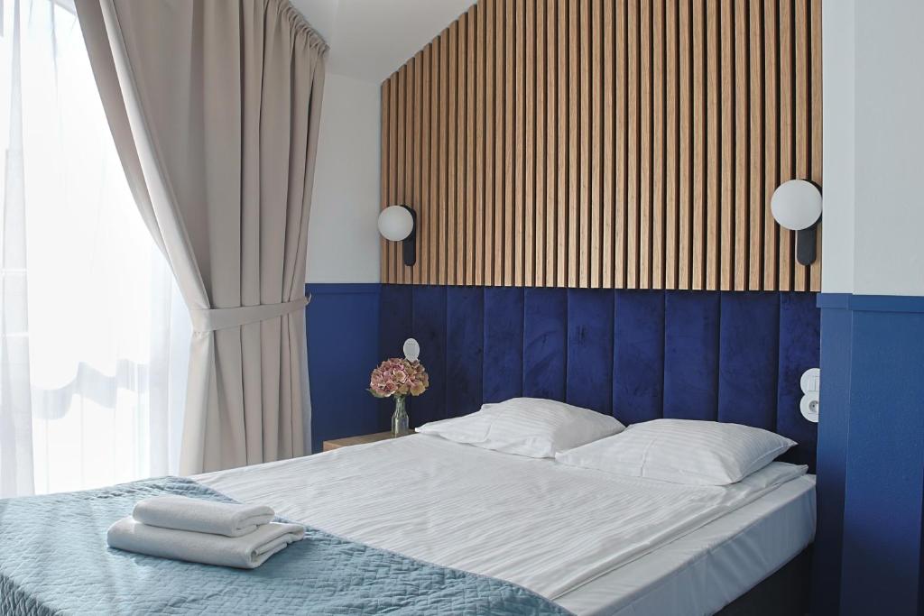 Postel nebo postele na pokoji v ubytování Baltic Hotel