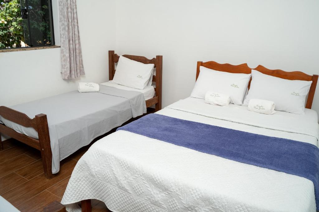 Postel nebo postele na pokoji v ubytování Casa com piscina vista para lago, 03 quartos confortáveis