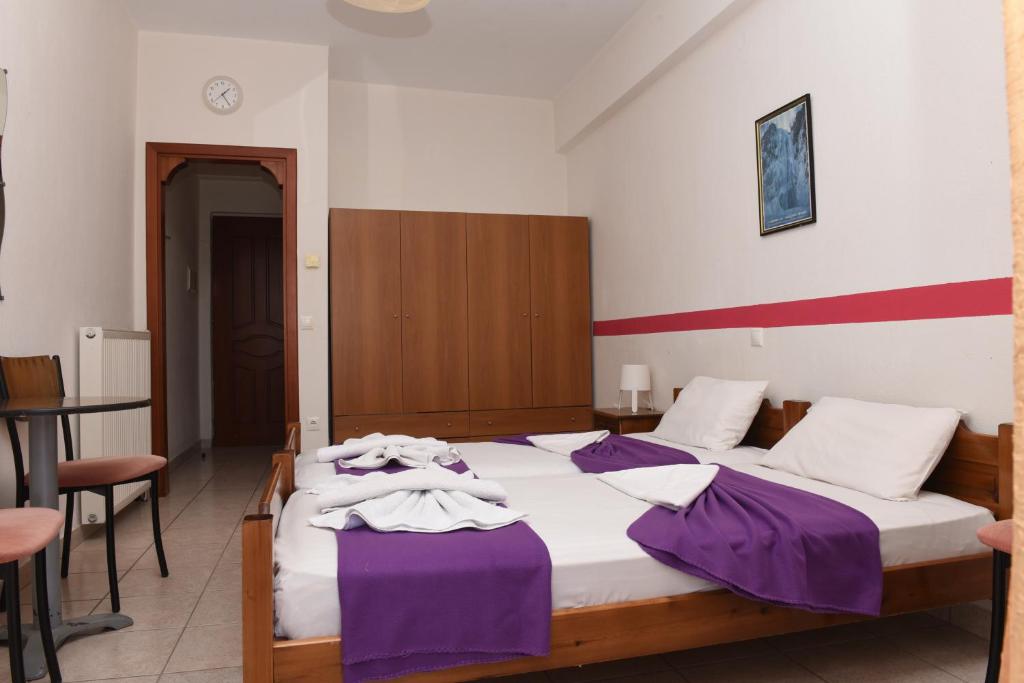 Postel nebo postele na pokoji v ubytování Star Beach Resort - Makrygialos Beachfront Nests