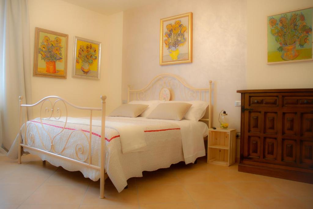 Postel nebo postele na pokoji v ubytování Art Gallery B&B Foresteria