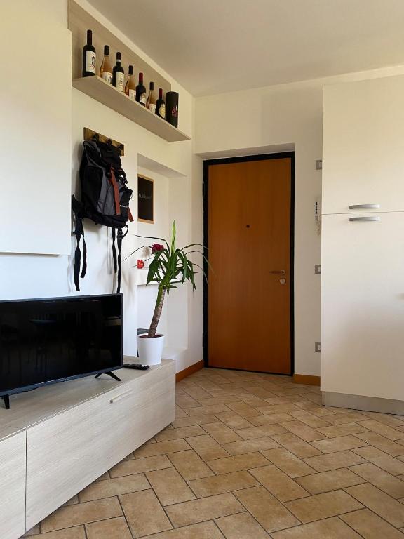 Μια τηλεόραση ή/και κέντρο ψυχαγωγίας στο Apartment in the heart of Valpolicella