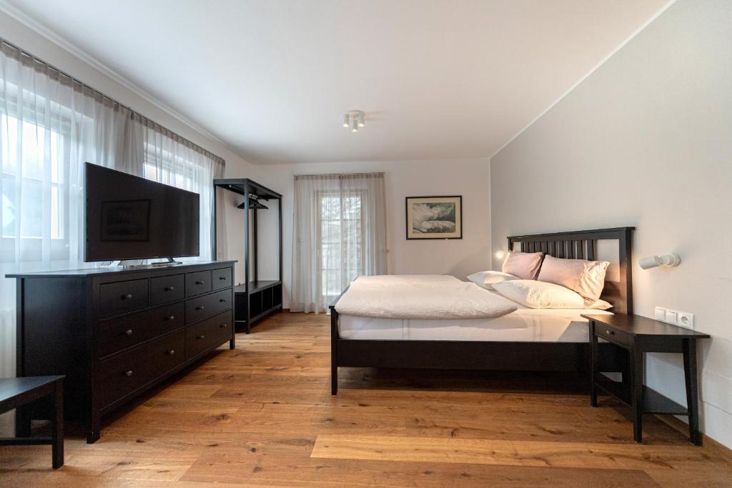 Łóżko lub łóżka w pokoju w obiekcie Panoramic Apartment 24