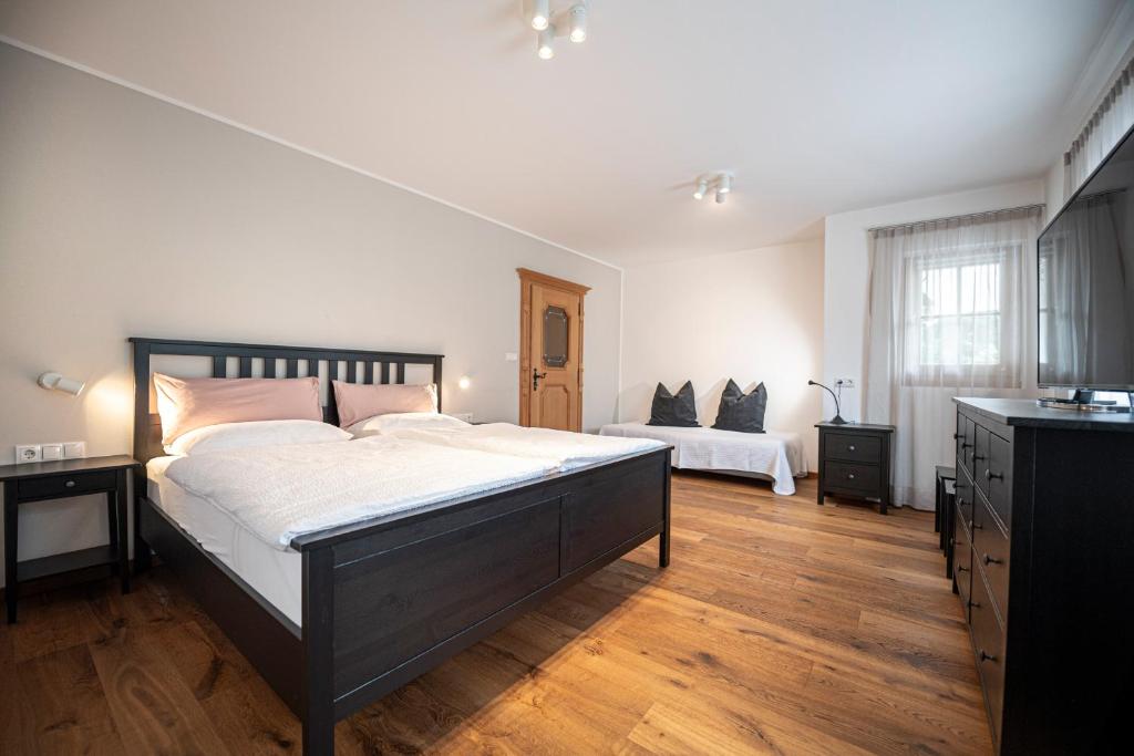 Łóżko lub łóżka w pokoju w obiekcie Panoramic Apartment 24